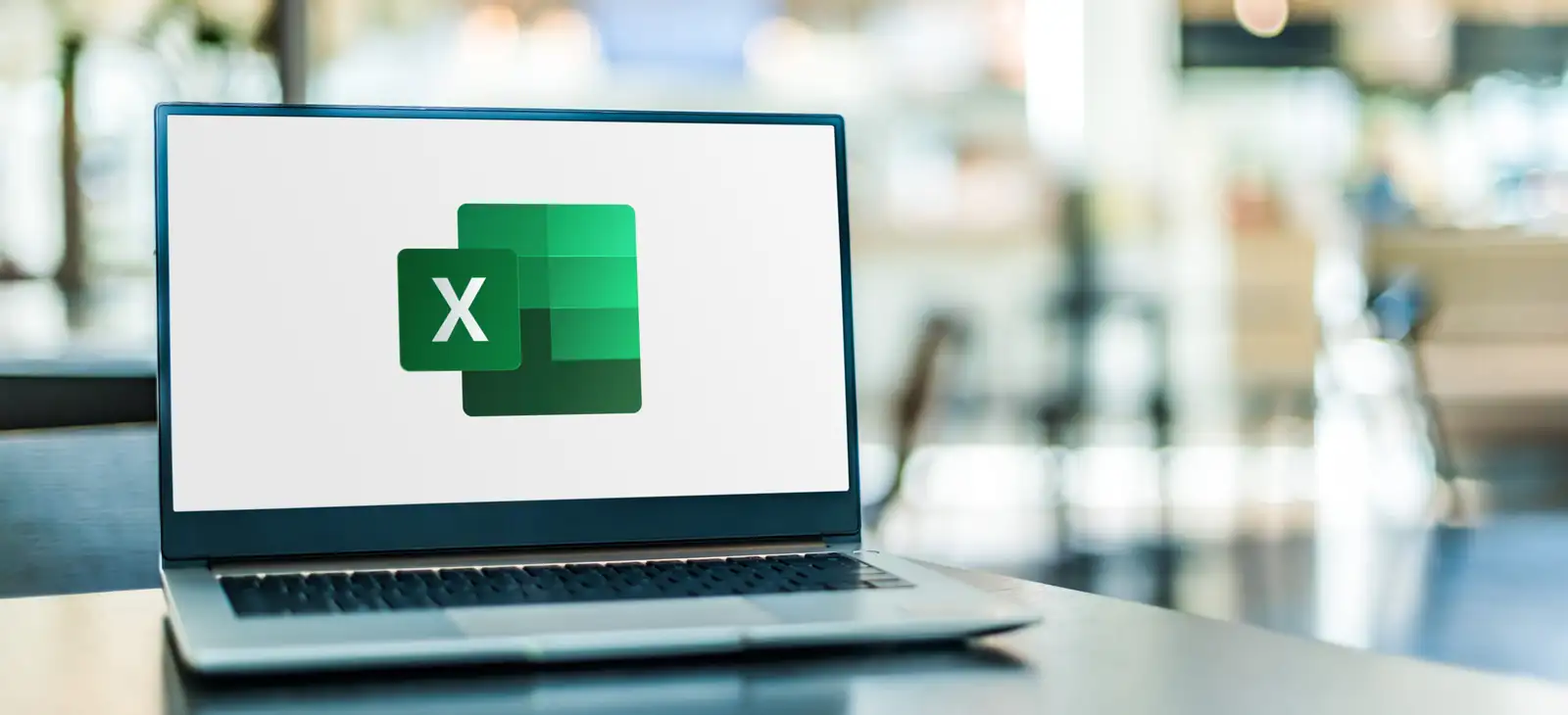 Laptop computer displaying logo of Microsoft Excel